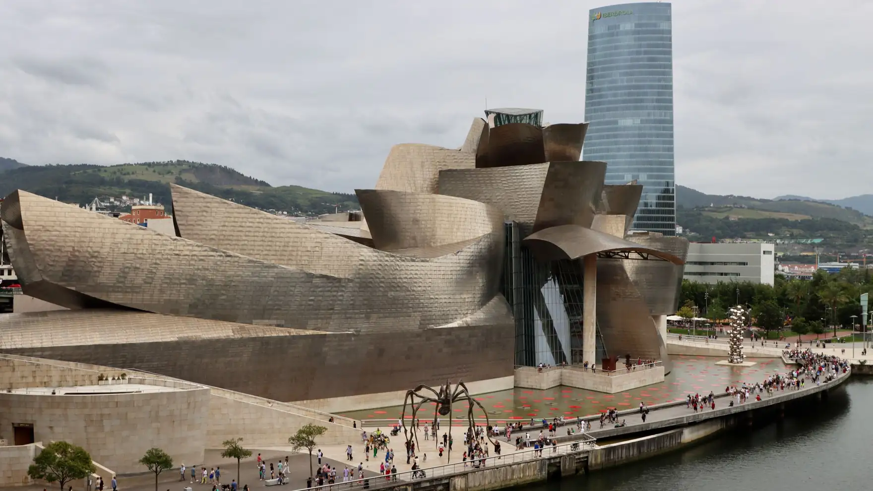 Aerial view of the Guggenheim Museum Bilbao and Iberdrola Tower, showcasing contemporary architecture