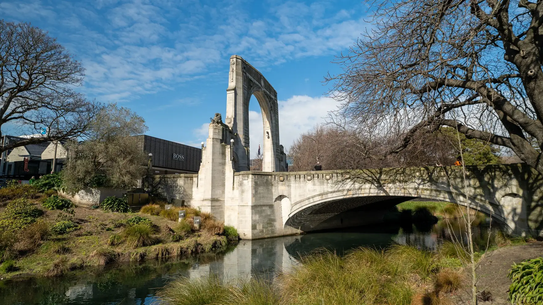 Scenic view of the Bridge of Remembrance in Christchurch, New Zealand, spanning the Avon River