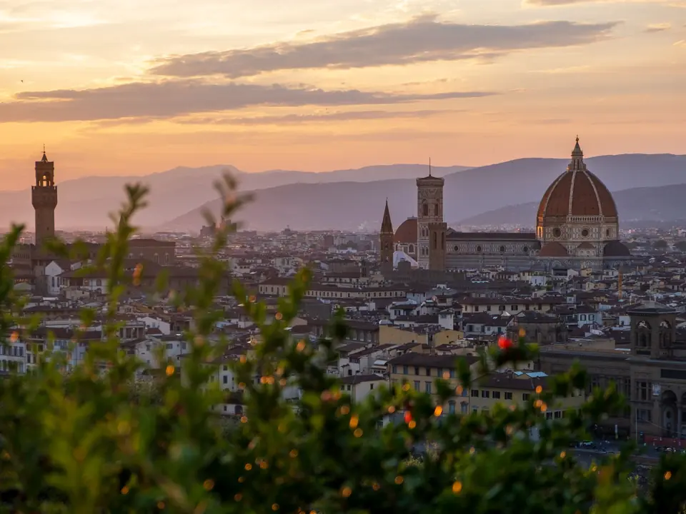 A stunning view of Florence, Italy, with the Duomo and skyline at sunset