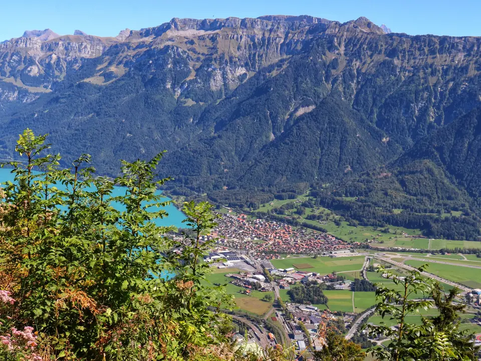 A stunning aerial view of Interlaken, nestled between mountains and lakes, viewed from Harder Kulm