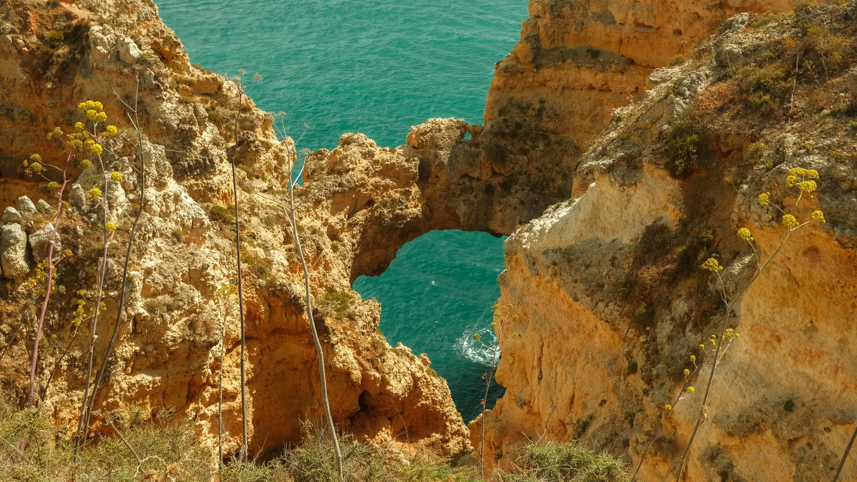 Explore the dramatic rock formations of Ponta da Piedade in Lagos, Portugal, a summer travel destination