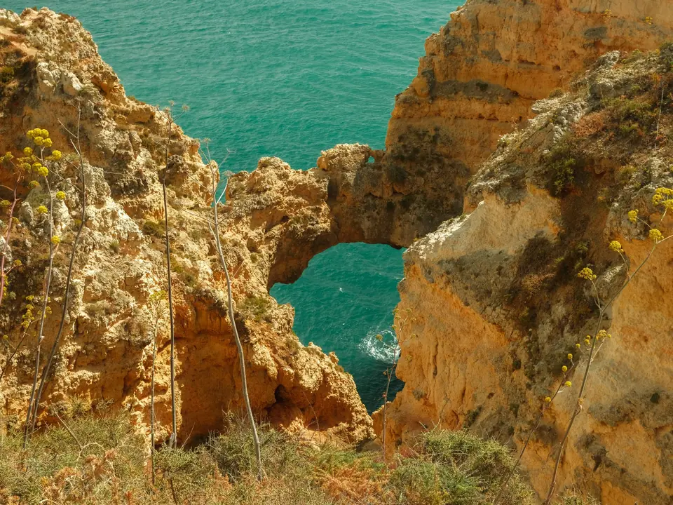 Explore the dramatic rock formations of Ponta da Piedade in Lagos, Portugal, a summer travel destination