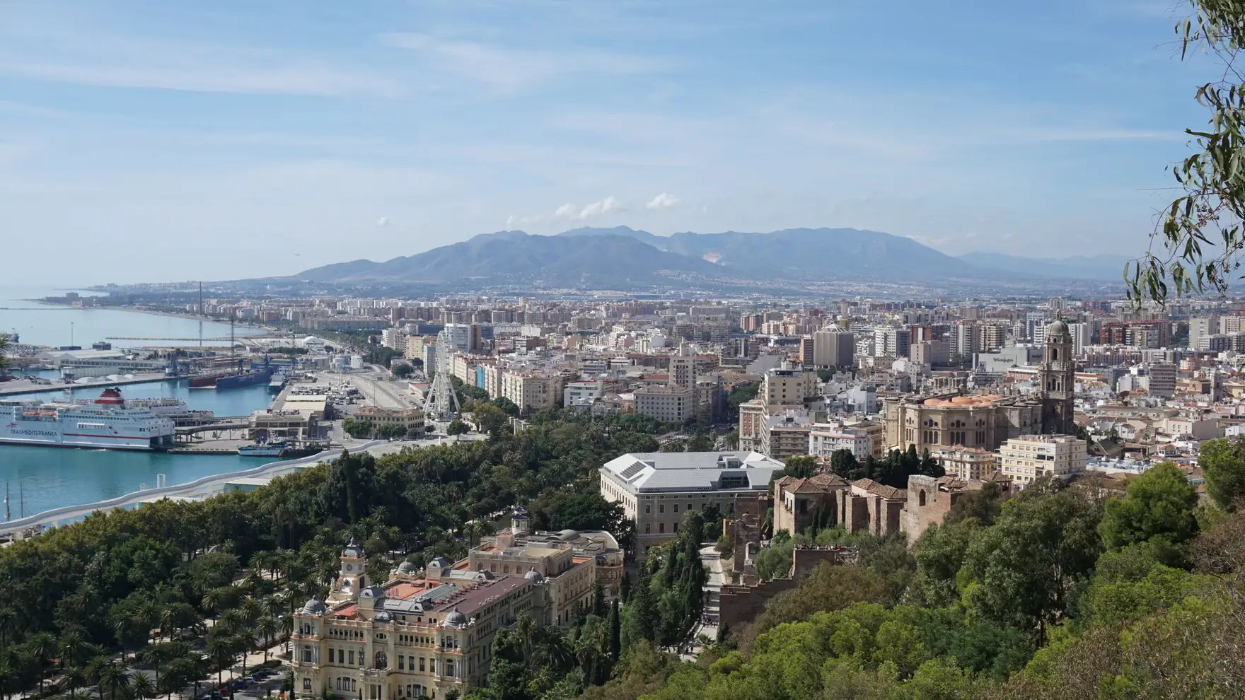Scenic aerial view of Malaga, Spain showcasing the cityscape and harbor