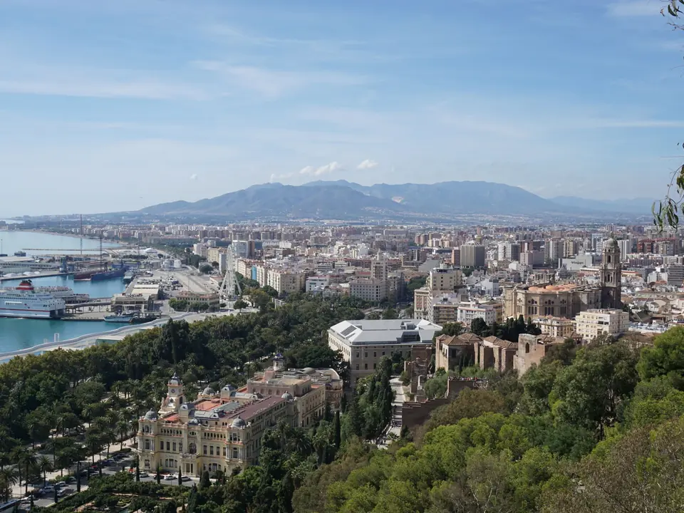 Scenic aerial view of Malaga, Spain showcasing the cityscape and harbor