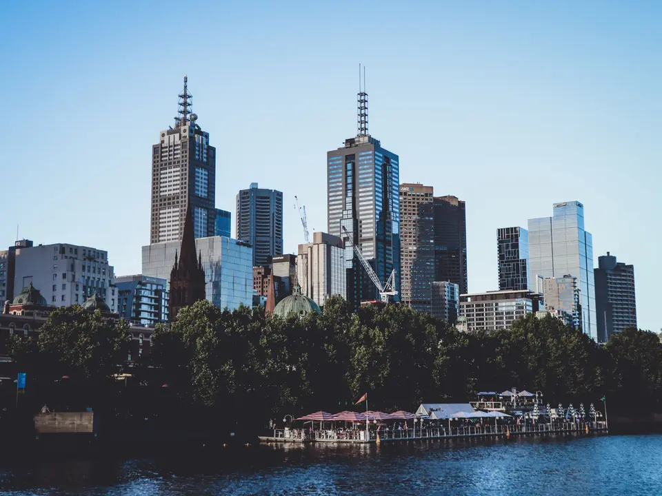 A breathtaking view of Melbourne's skyline over the waterfront, showcasing modern skyscrapers
