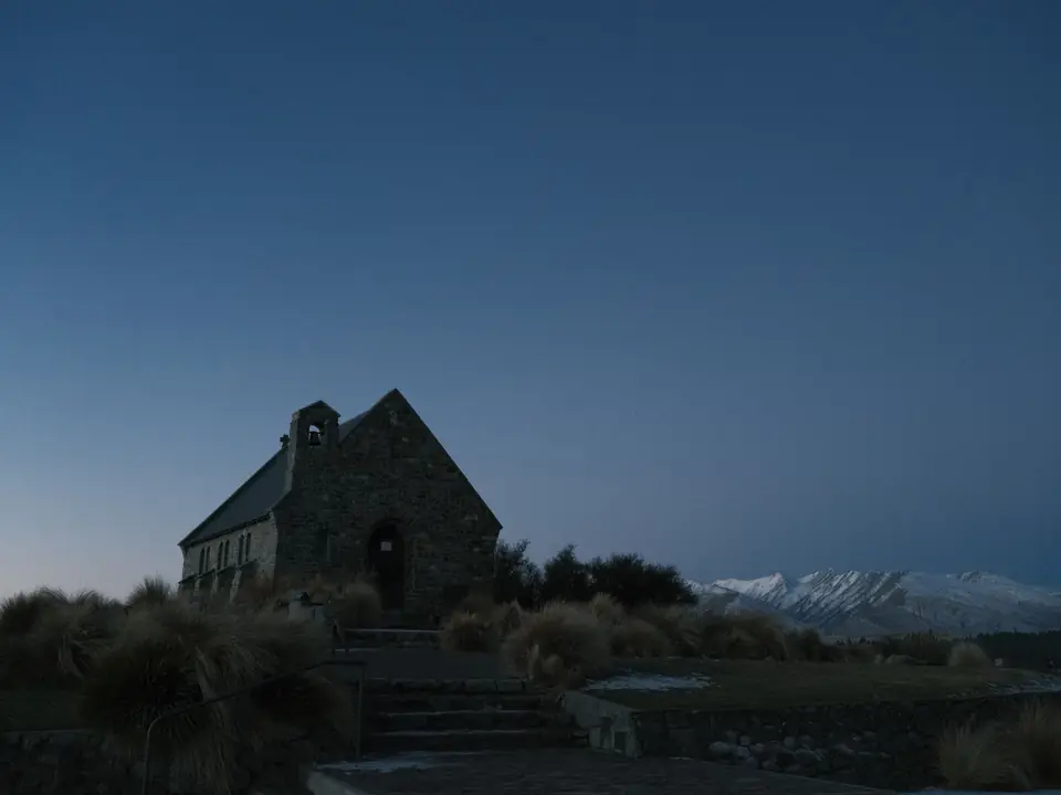 Tranquil evening at Church of the Good Shepherd, Lake Tekapo, New Zealand with twilight sky