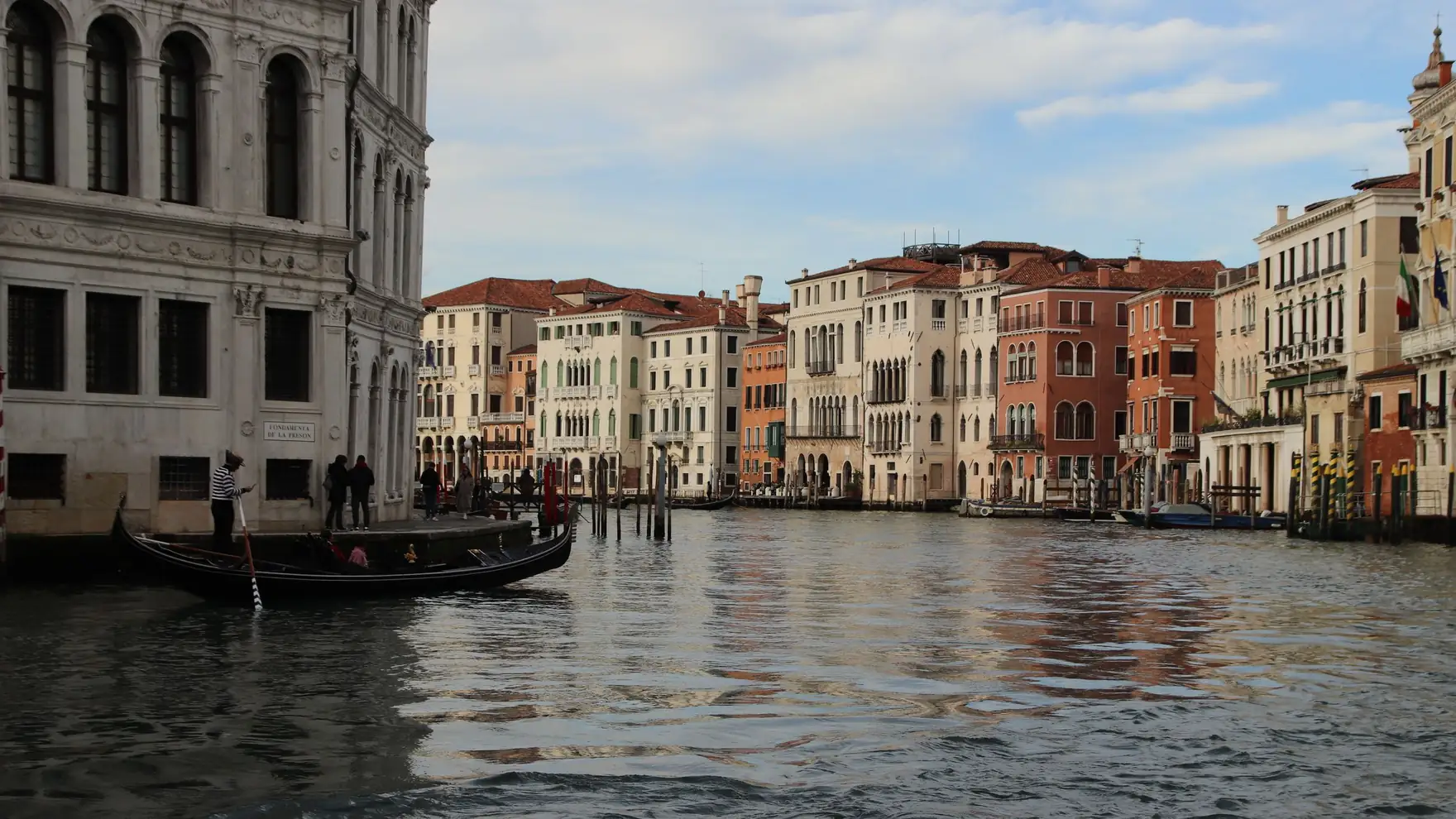 Captivating view of Venice's Grand Canal with a gondola and iconic architecture