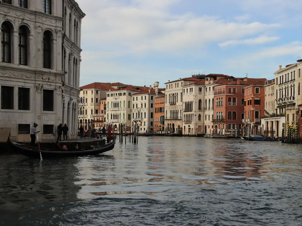 Captivating view of Venice's Grand Canal with a gondola and iconic architecture