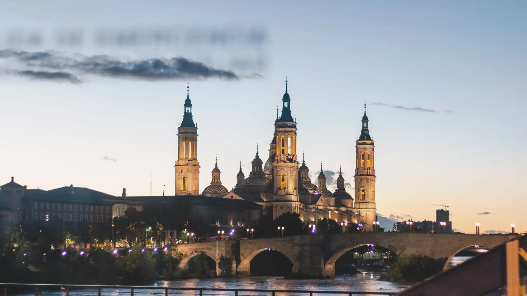 Capture of Basilica de Nuestra Señora del Pilar at twilight over the Ebro River in Zaragoza, Spain